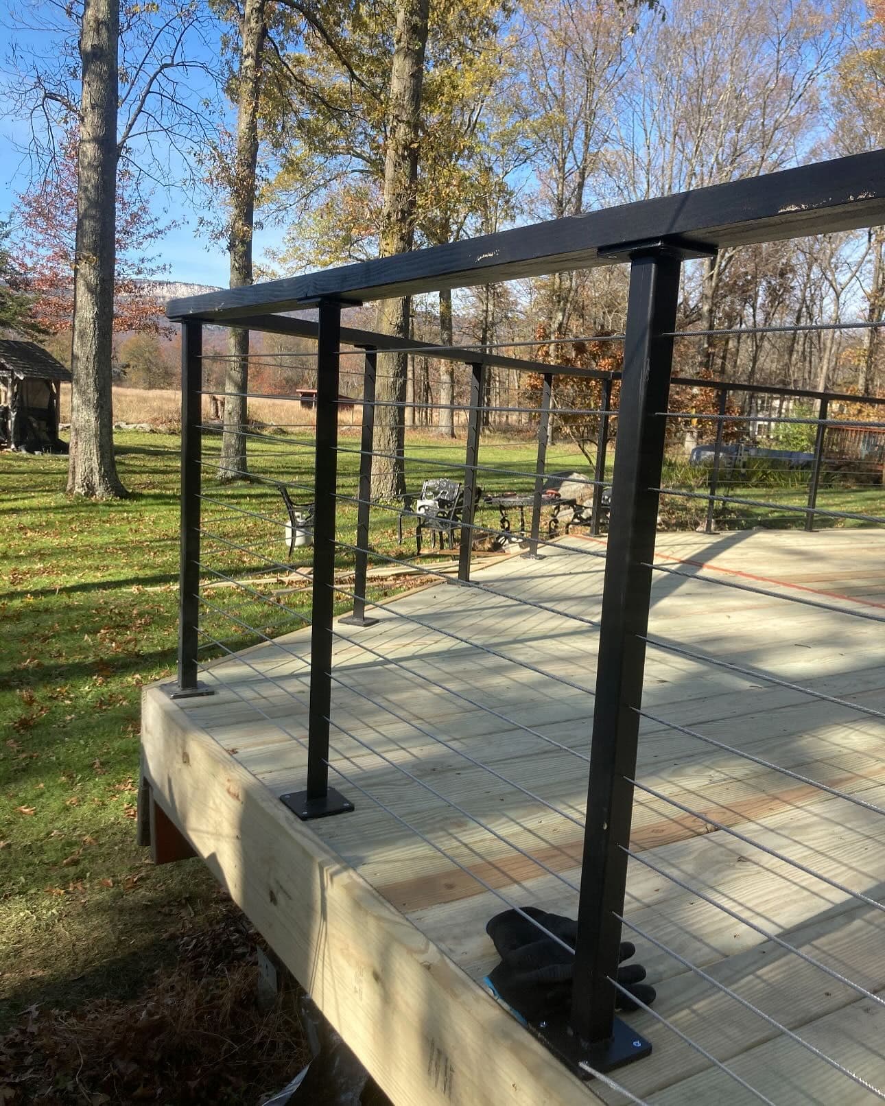 Custom ornamental steel railing with cable system in Hurley, NY.